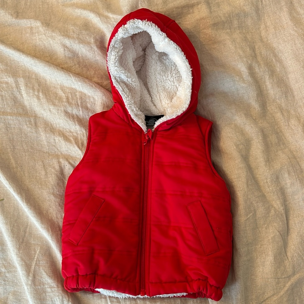 Red hooded vest, furry lining